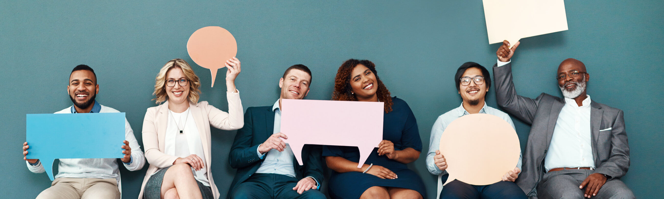 4 associates having a discussion over coffee