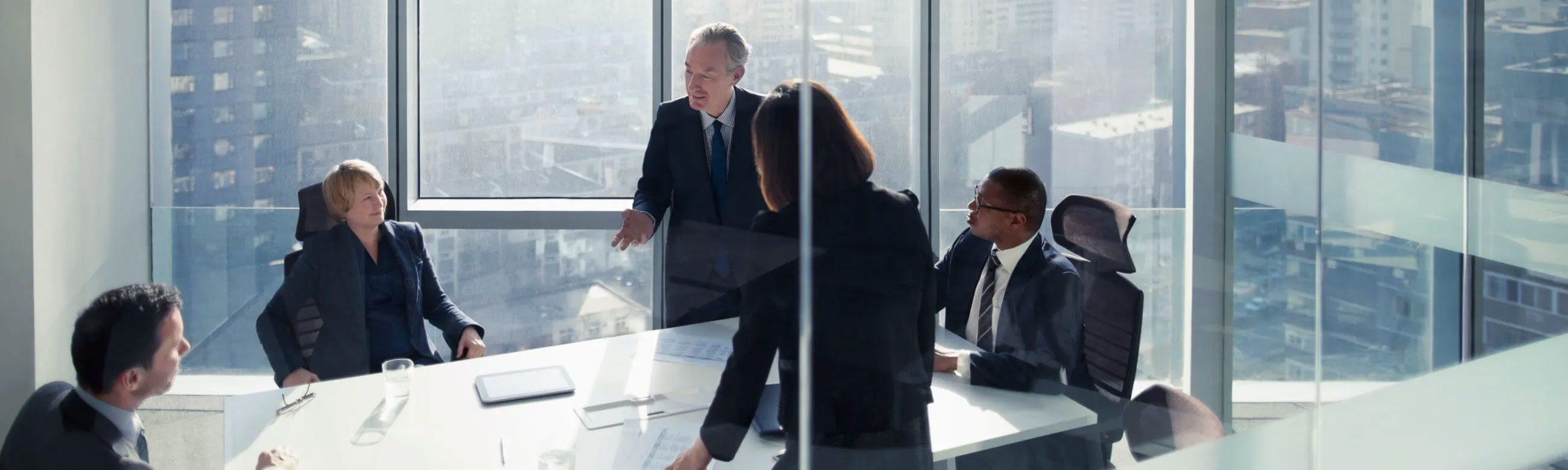 Group having a business meeting