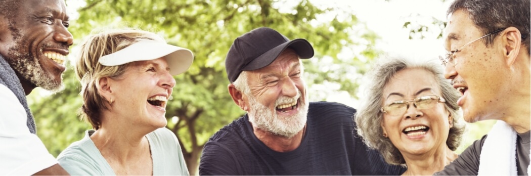 5 older people laughing